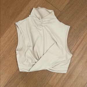 Elegant Cream Sleeveless Top with skirt